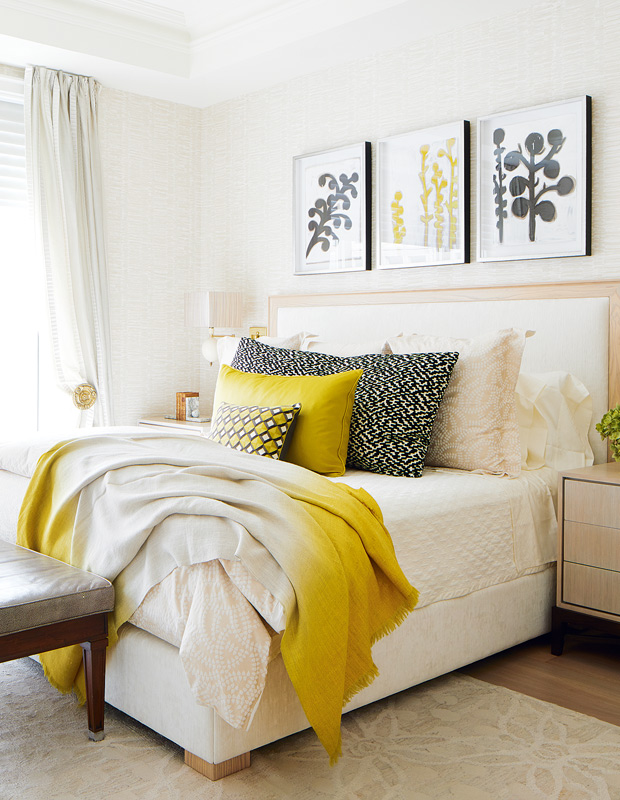 Colette Van Den Thillart condo principal bedroom with pops of yellow
