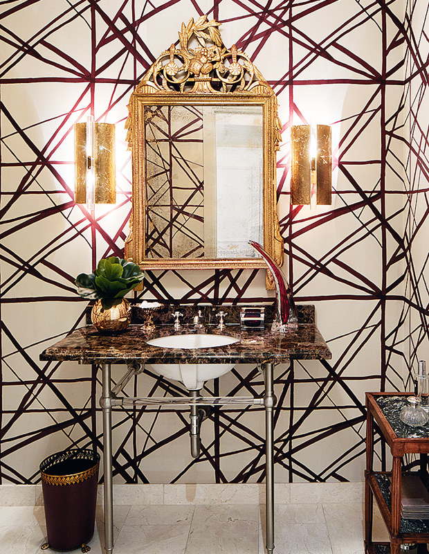 Colette Van Den Thillart condo powder room with graphic wallpaper and modern sconces