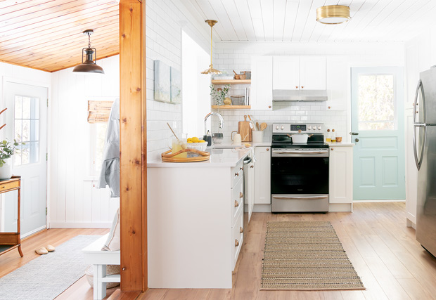 Lakeside cottage makeover kitchen with a mint door