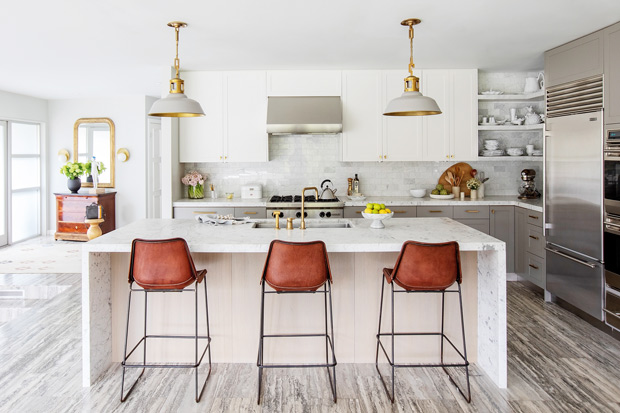 Rosie Daykin's kitchen with leather bar stools and grey and brass light fixtures