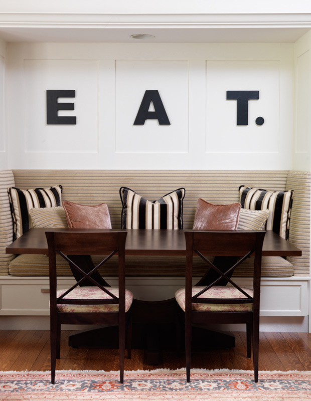 how to decorate like emily griffin banquette with graphic "Eat" sign