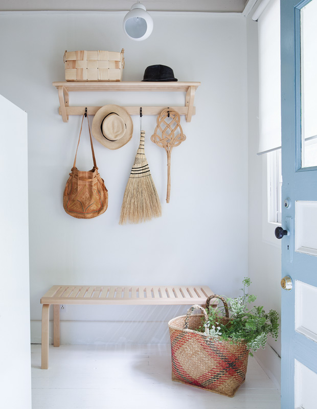 Mjolk Shop country home front entrance with a minimalist bench