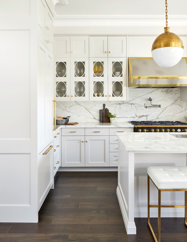 kitchen with a veined marble backsplash