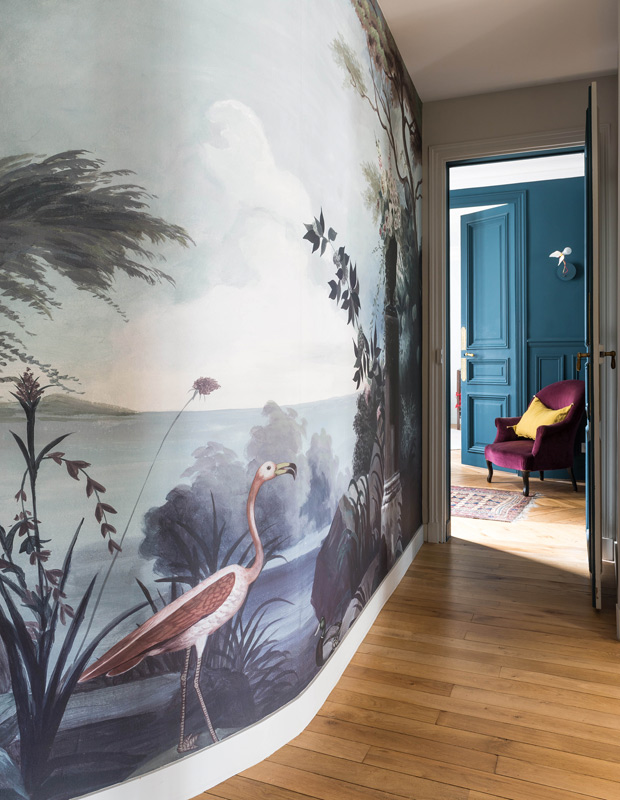 hallway with a curvy wall and natural mural