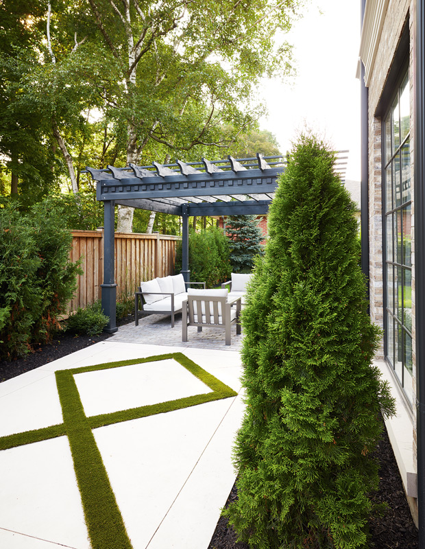 2019 Princess Margaret Showhome's garden with a pergola-covered lounge area