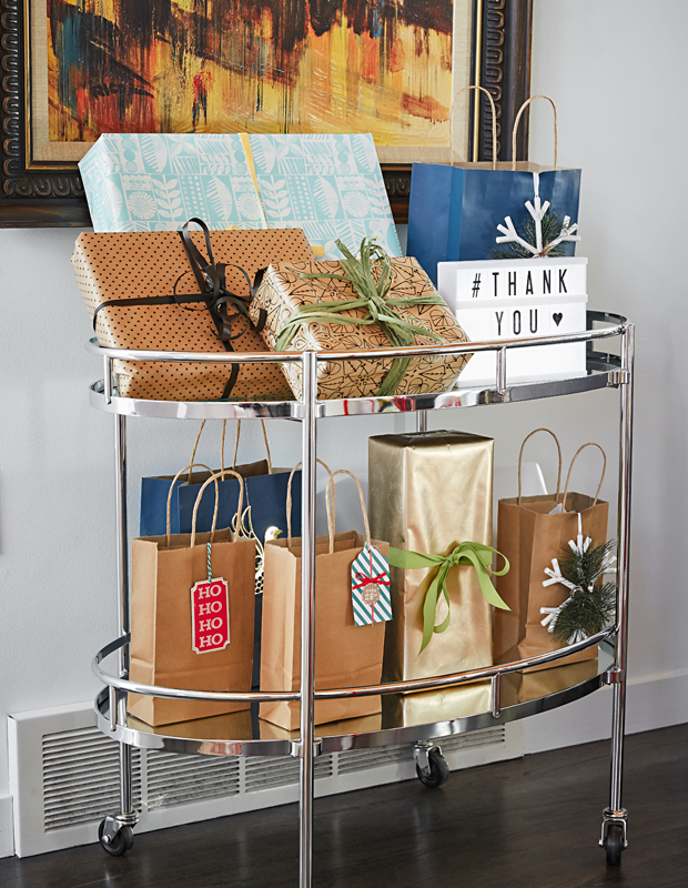 Ali Velji Christmas presents in a bar cart