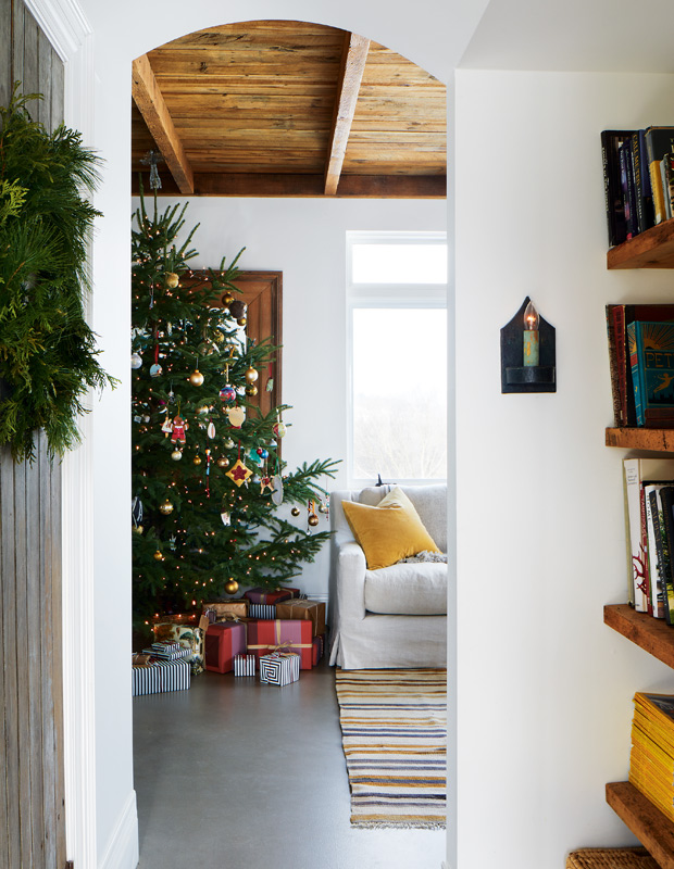 festive farmhouse living room and Christmas tree
