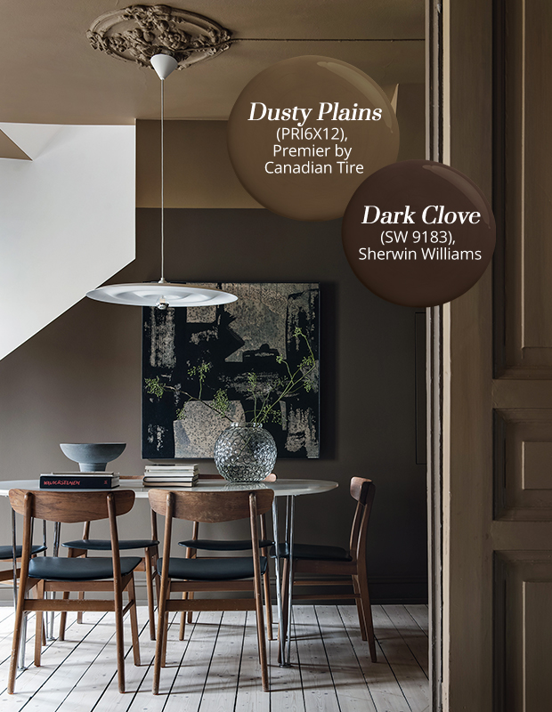 A dining room with chocolate paint tones such as "Dusty Plains" and "Dark Clove".