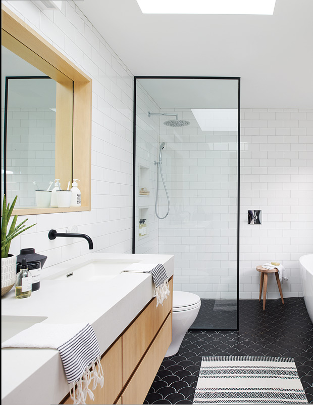 decorated minimalism bathroom with subway tile and a wet room-style shower