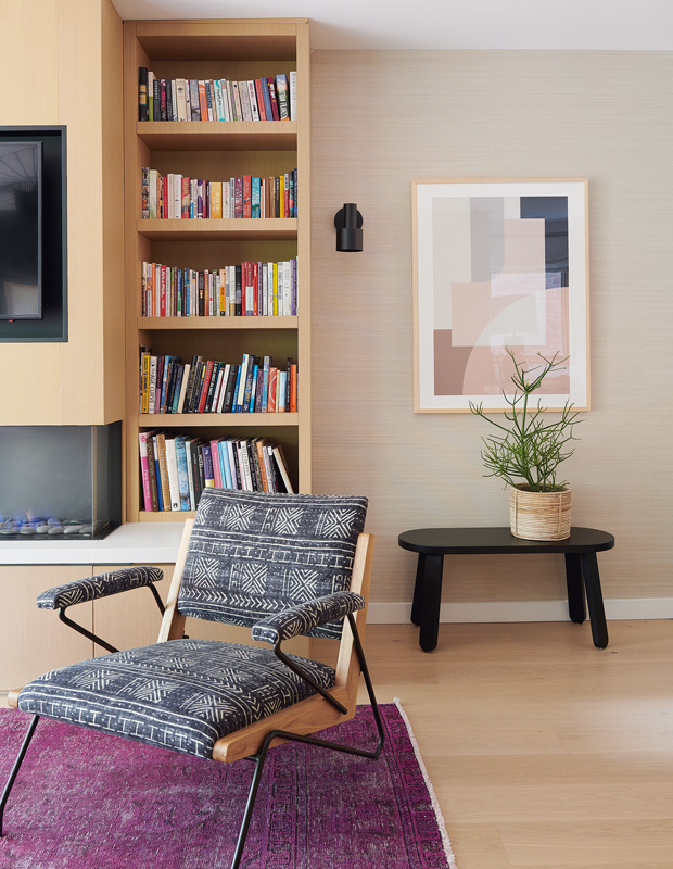 decorated minimalism living room bookshelf with a foldable chair