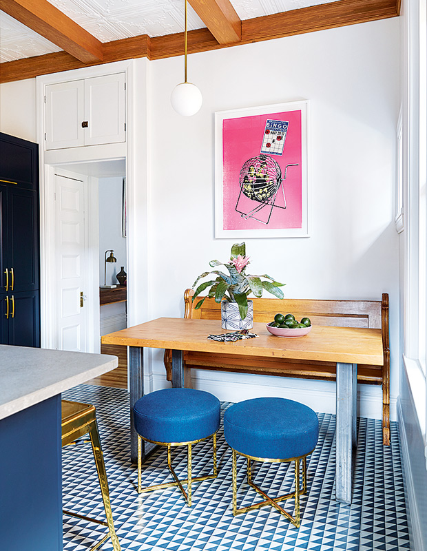 cozy breakfast nook with cobalt stools and old church pew