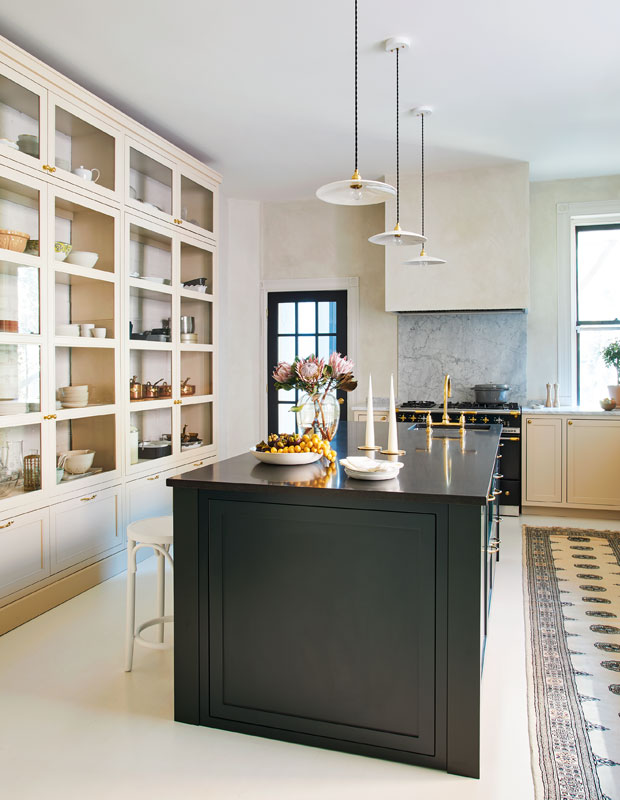 House & Home's Kitchen of the Month with glass-fronted cabinets.