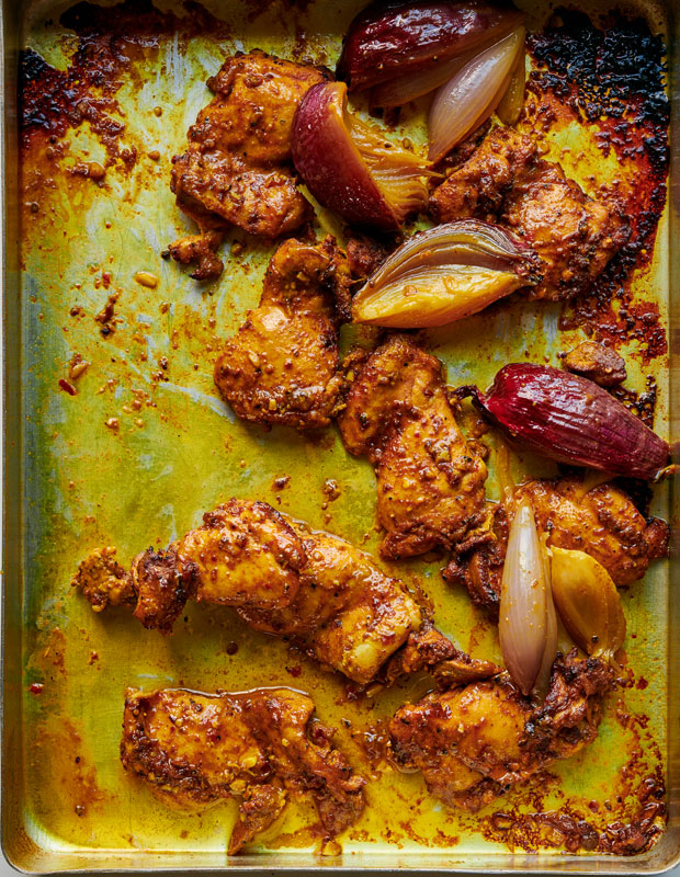 Chicken Schawarma in a pan.
