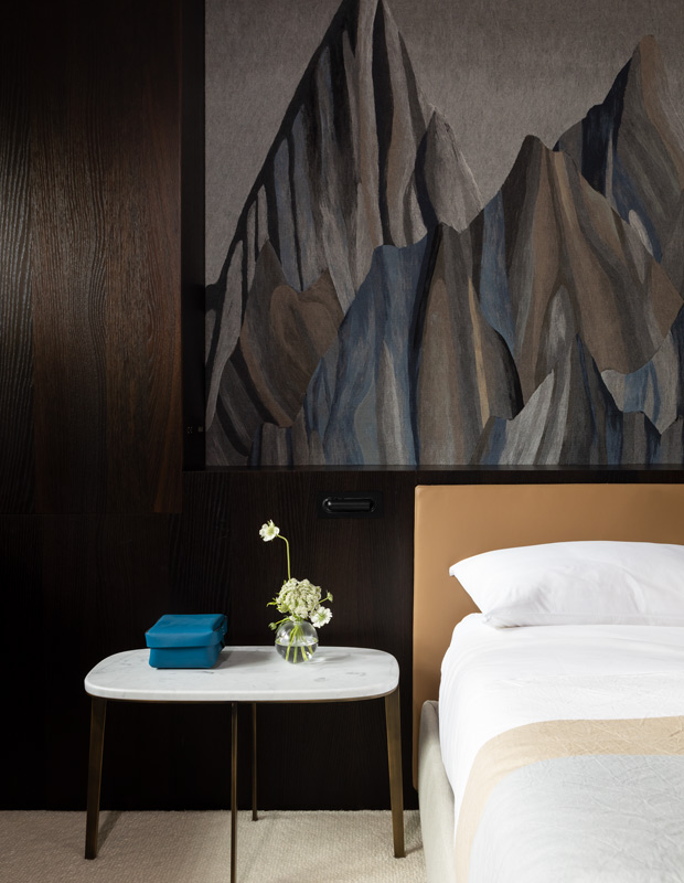 whistler ski home principal bedroom with a neutral palette and mountain artwork