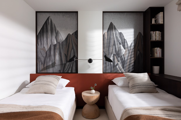 whistler ski home guest bedroom with two twin beds and mountain artwork