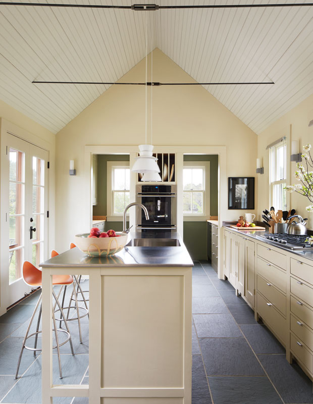 A farmhouse kitchen painted a creamy beige color.