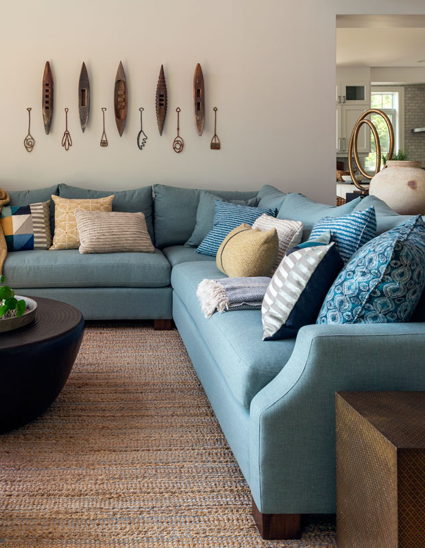 Living room with aquatic green couches