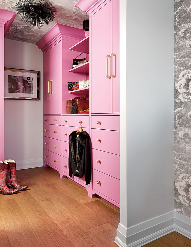 closet with ceiling wallpaper