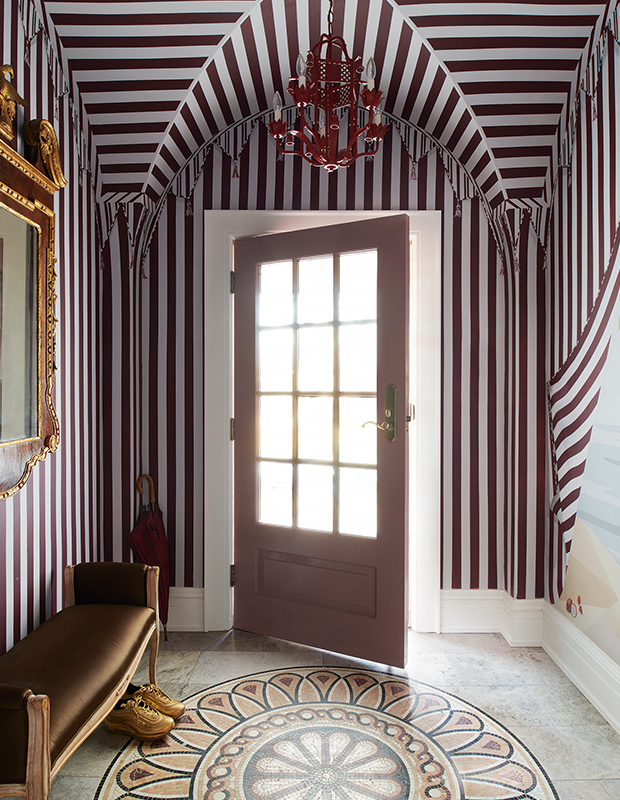 foyer with ceiling wallpaper