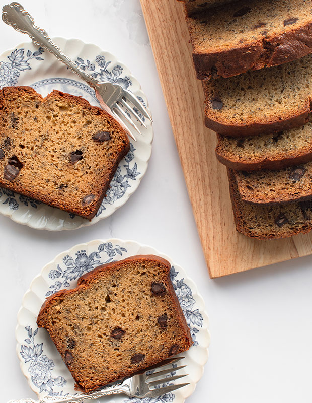 Sliced banana loaf on plates. Banana Chocolate Loaf
