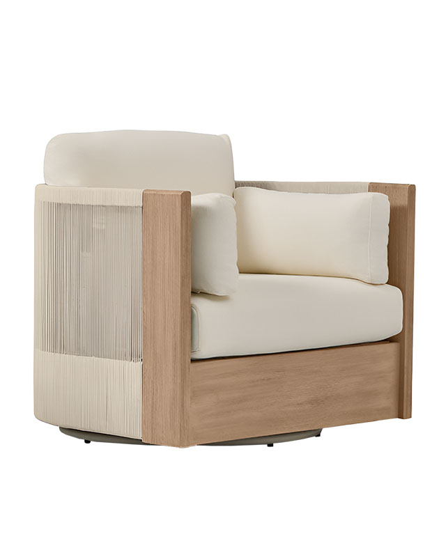 A blonde wood swivel chair with coord detailing down the back and sides.