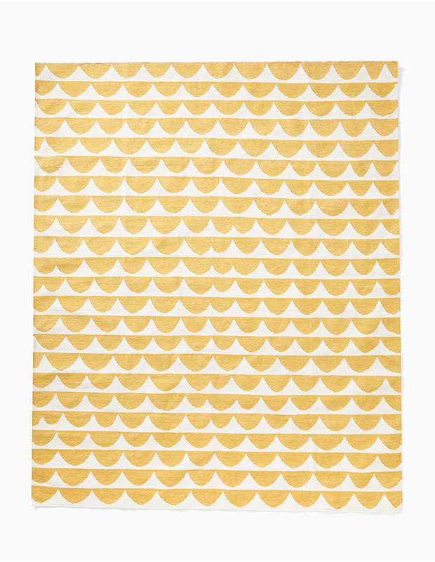 A white and yellow patterned rug