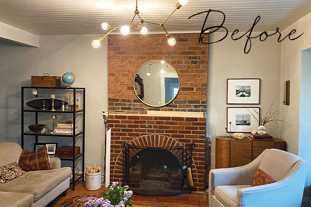 An image of a brick fireplace in a living room.
