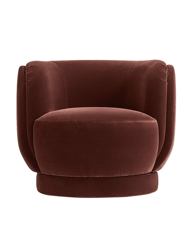 Calm, stylish accents: An image of a burgundy swivel chair.