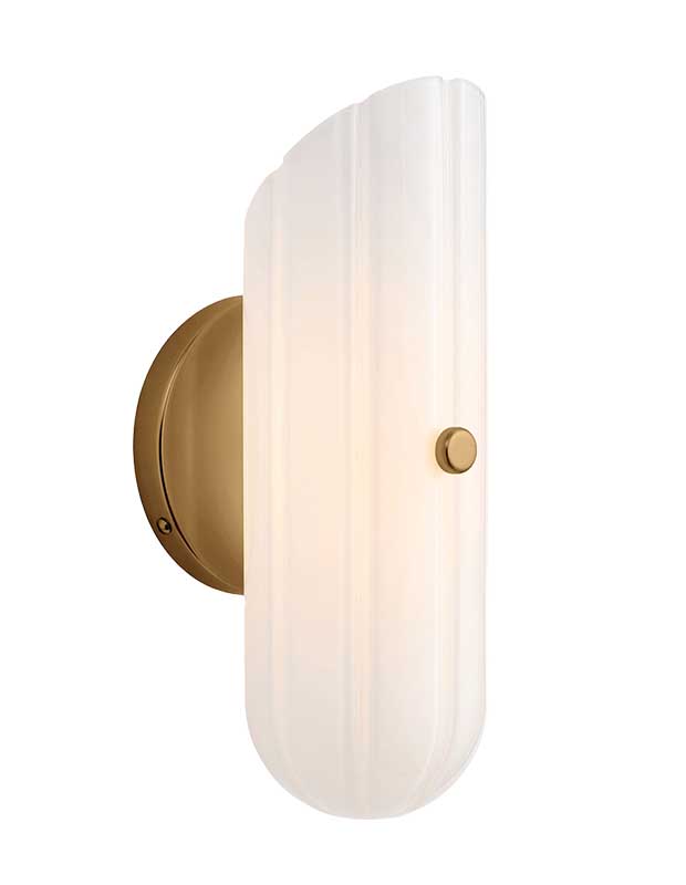 A photo of an art deco statement sconce with a brass base and white frosted glass shade against a white background.
