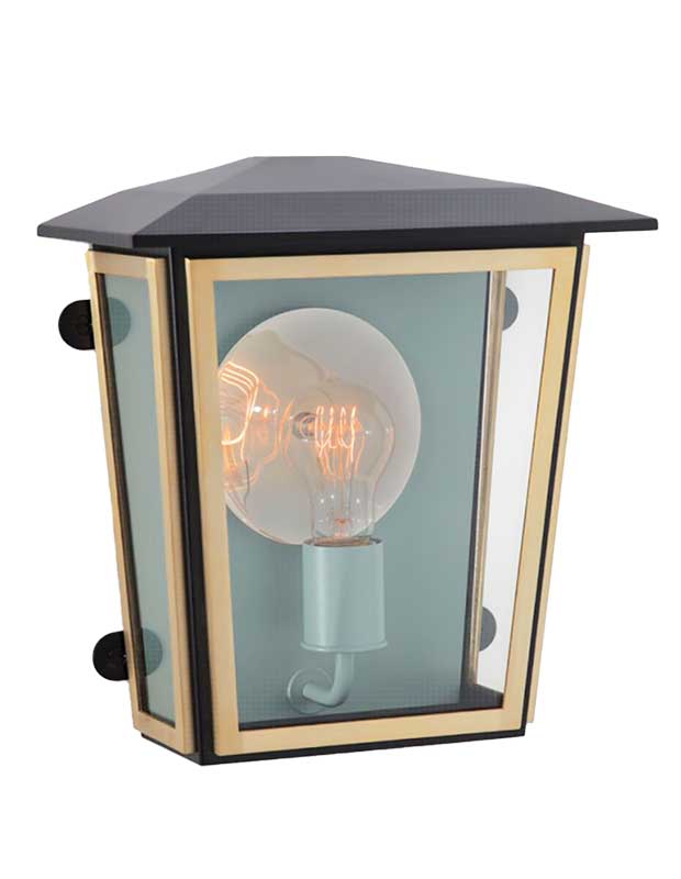 A photo of a statement sconce in a lantern shape with a black exterior and glass panes. The interior is painted a powder blue and a single edison bulb sits in the middle.