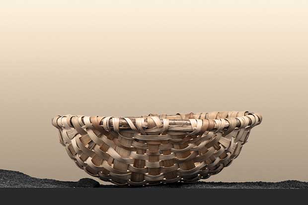 Weaved oak tattle from Bard’s collection sits on a bed of black gravel, meant to reflect the Scottish landscape.